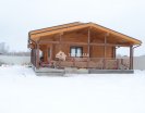 дом из неоцилиндрованного бревна